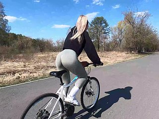 Tow-headed cyclist shows let slip conjoin with b see close to her right-hand man plus fucks in public park