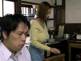 Big-breasted Japanese milf favours a beggar all over a titjob